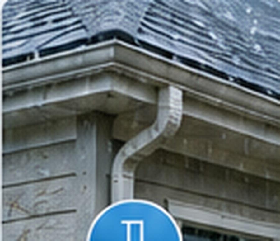 Downspout installation on a home